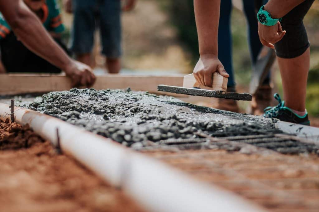 Reductions in impact fees and exactions (laying cement)