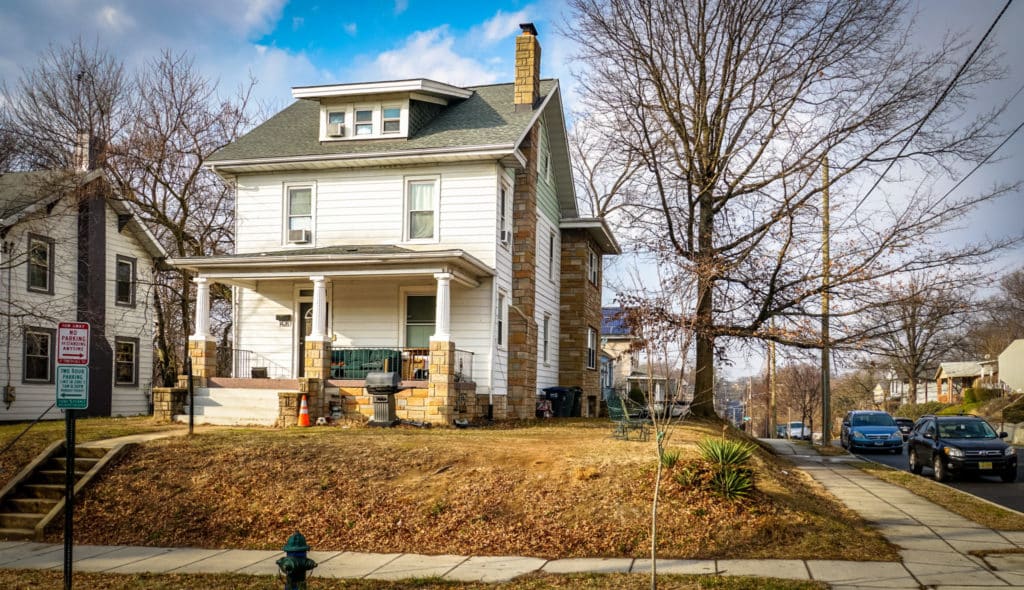 Foreclosure and disposition of tax-delinquent properties (two story house)