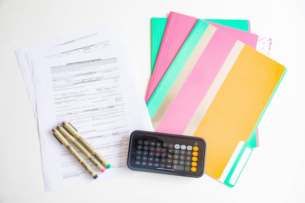 Loan Application, Calculator, Higlighters, and Folders