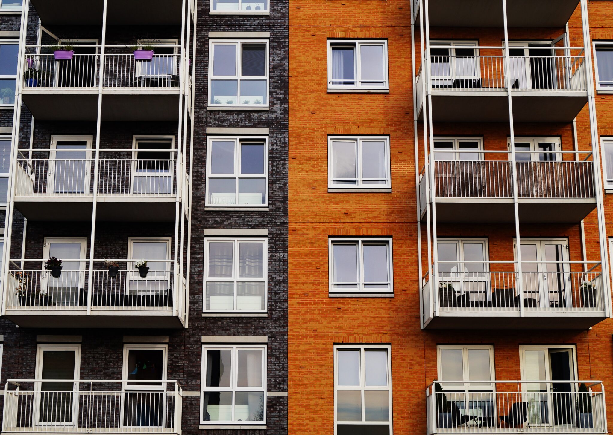 Multi-story apartment building showing four floors