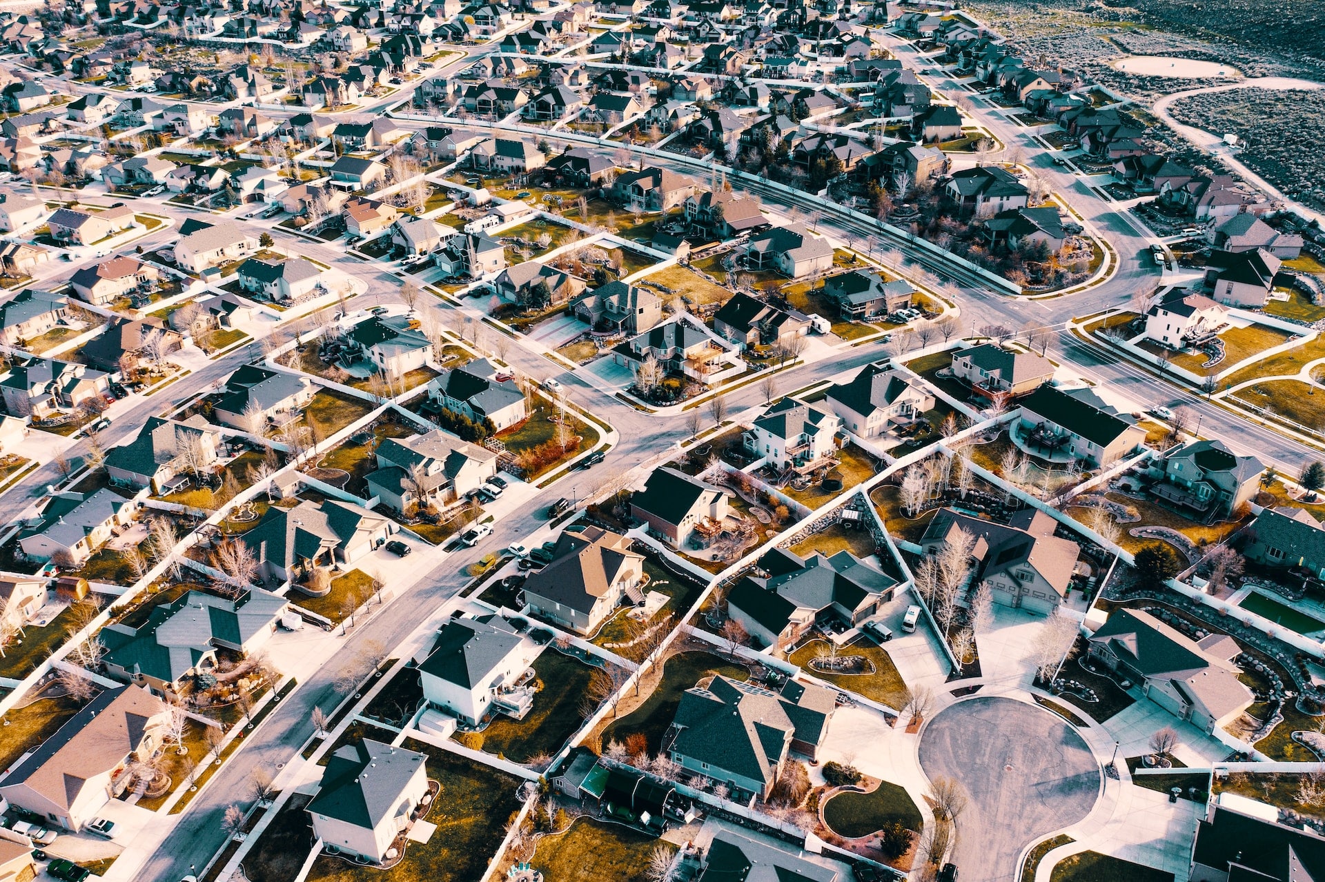 Image of single-family homes in the suburbs is shown.