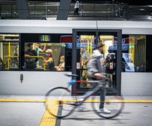 Transportation is an example of community development. A subway station and train are shown to illustrate that.