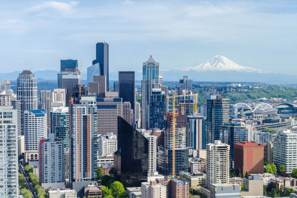 A picture of Seattle is shown to illustrate a program designed to break the homelessness-prison cycle